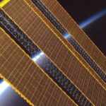 gold solar panels in space