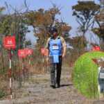 prince harry walks through angola minefields
