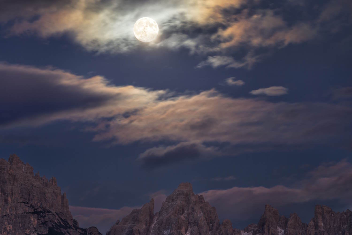 Lunar iridescence over Dolomites captured by astrophotographer Alessandra Masi - breathtaking celestial phenomenon